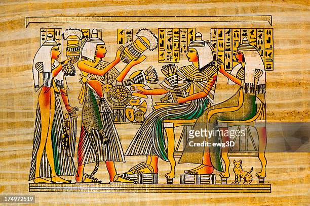 egyptian ancient papyrus - cleopatra statue stock illustrations