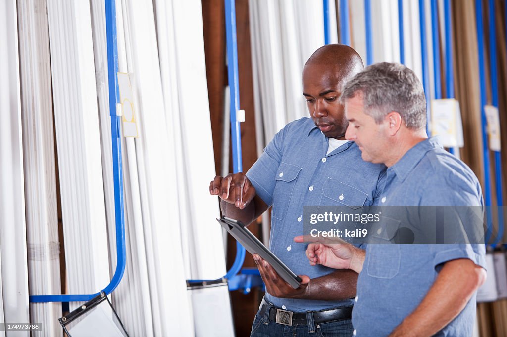 Two men in building supply store