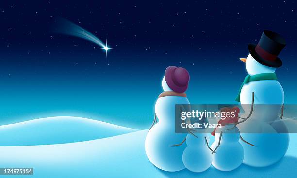cartoon snowman family of four wishing on a shooting star - snowman family stock illustrations