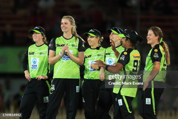 Lauren Bell of the Thunder celebrates the wicket of Lauren Cheatle of the Sixers during the WBBL match between Sydney Thunder and Sydney Sixers at...