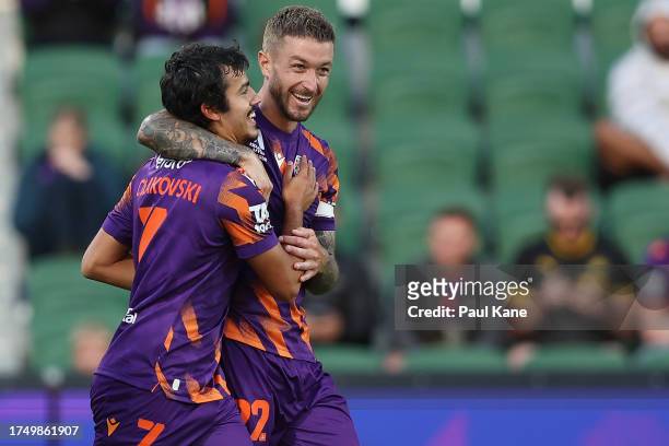 Stefan Colakovski and Adam Taggart of the Glory celebrate a goal during the A-League Men round one match between Perth Glory and Newcastle Jets at...