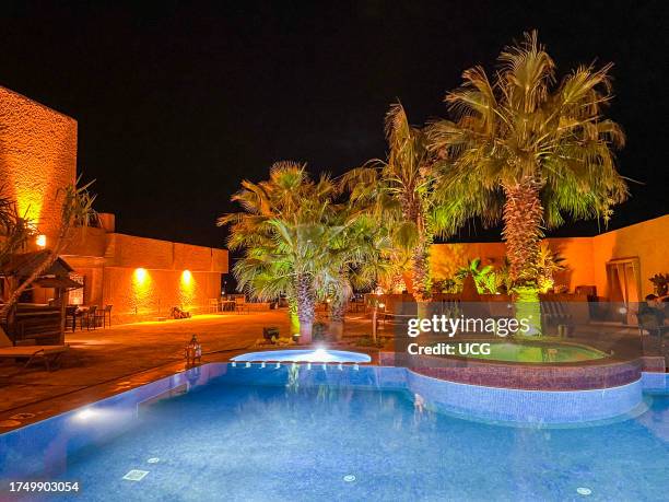 Morocco, Swimming pool in luxury hotel.