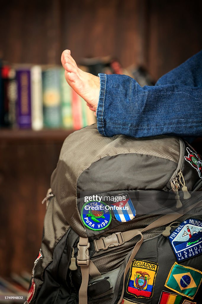 Human Feet on a Backpack Full Of Country Patches
