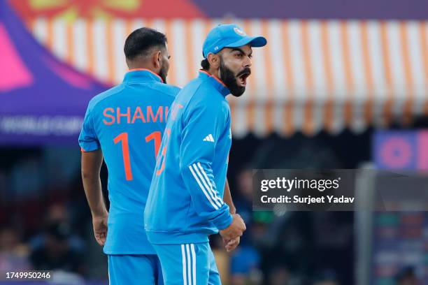 Virat Kohli of India celebrates during the ICC Men's Cricket World Cup India 2023 match between India and New Zealand at HPCA Stadium on October 22,...