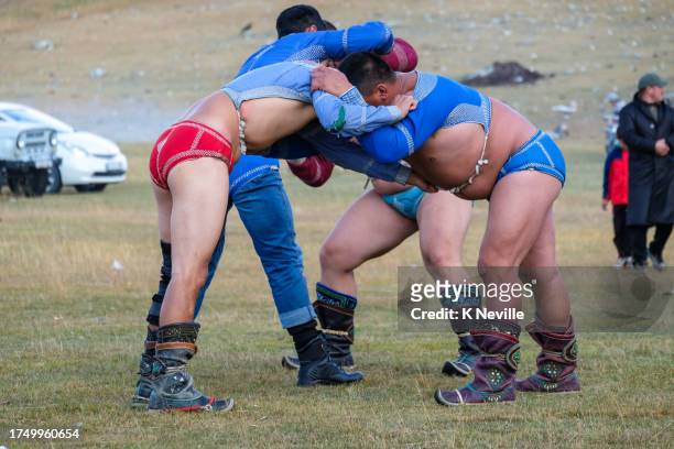 mongolian wrestling competition - mongolian wrestling stock pictures, royalty-free photos & images