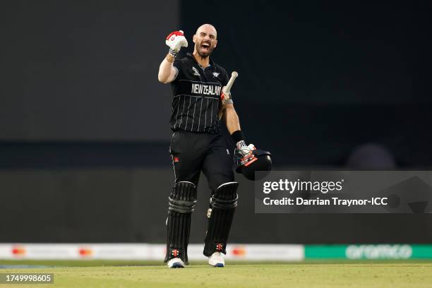 Daryl Mitchell of New Zealand celebrates their century during the ICC Men's Cricket World Cup India 2023 match between India and New Zealand at HPCA...