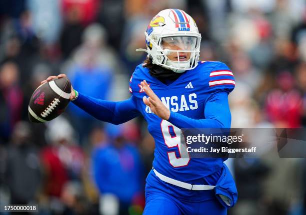 Quarterback Jason Bean of the Kansas Jayhawks throws a pass during the first half against the Oklahoma Sooners at David Booth Kansas Memorial Stadium...