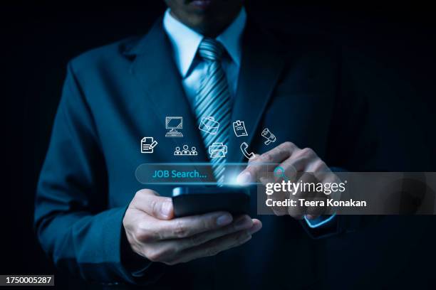 businessman using online job search application using search console with your website. - vacancy stock pictures, royalty-free photos & images
