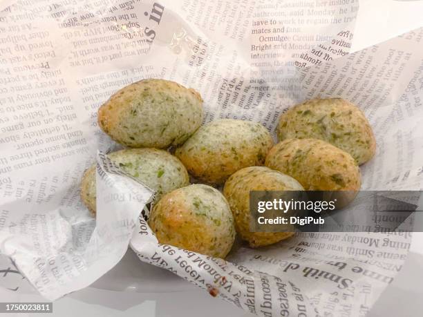 sea lettuce zeppoline served at oyster bar - nori stock-fotos und bilder