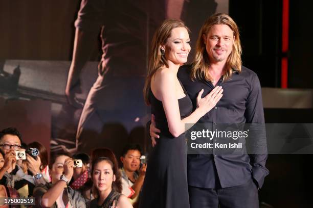 Actress Angelina Jolie and actor Brad Pitt attend the 'World War Z' Japan Premiere at Roppongi Hills on July 29, 2013 in Tokyo, Japan. The film will...