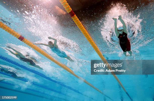 Alicia Coutts of Australia, Katinka Hosszu of Hungary and Shiwen Ye of China compete during the Swimming Women's 200m Individual Medley Final on day...