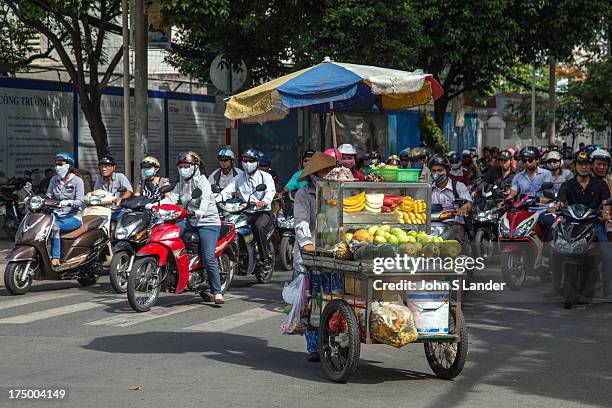 They say you don't really live in Saigon until you start to drive your own motorbike. There are so many motorbikes swarming the streets, from Dreams...