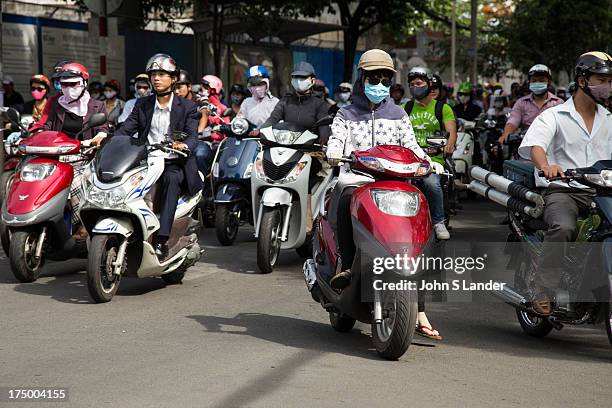 They say you don't really live in Saigon until you start to drive your own motorbike. There are so many motorbikes swarming the streets, from Dreams...