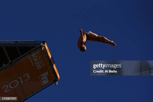 Kent De Mond of the USA competes during the Men's 27m High Diving on day ten of the 15th FINA World Championships at Moll de la Fusta on July 29,...