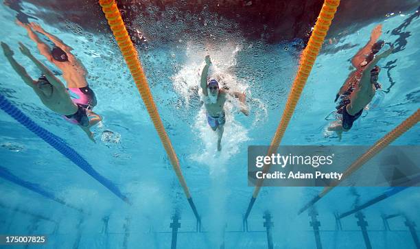 David Brandl of Austria, Victor Martin Martin of Spain and Cristian Quintero of Venezuela compete during the Swimming Men's 200m Freestyle heat 4 on...