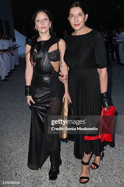 Lady Gaga and Marina Abramovic attend The 20th Annual Watermill Center Summer Benefit at The Watermill Center on July 27, 2013 in Water Mill, New...