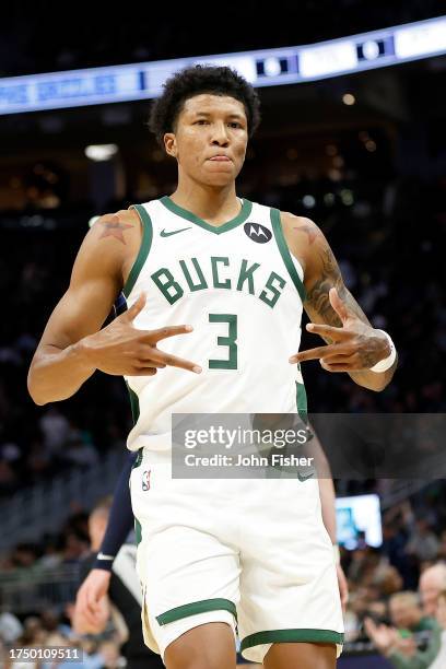 MarJon Beauchamp of the Milwaukee Bucks reacts after hitting a three point shot in a preseason game against the Memphis Grizzlies at Fiserv Forum on...