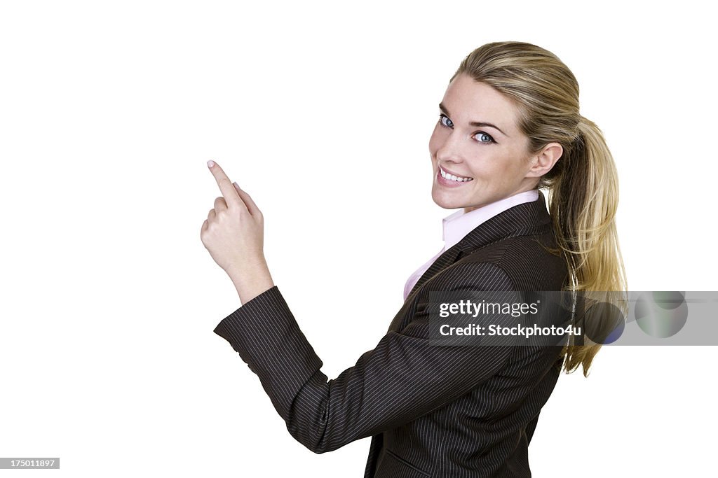 Businesswoman pointing to copy space