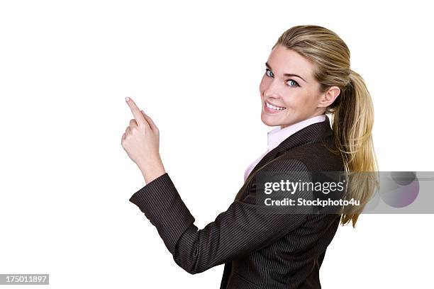 businesswoman pointing to copy space - blonde hair rear white background stock pictures, royalty-free photos & images