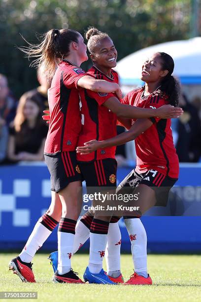 Nikita Parris of Manchester United celebrates after scoring the team's second goal with team mates during the Barclays Women´s Super League match...
