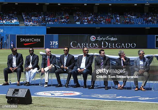 Former player Carlos Delgado of the Toronto Blue Jays is honored in a pre-game ceremony placing his name on The Level of Excellence as Nadir Mohamed...