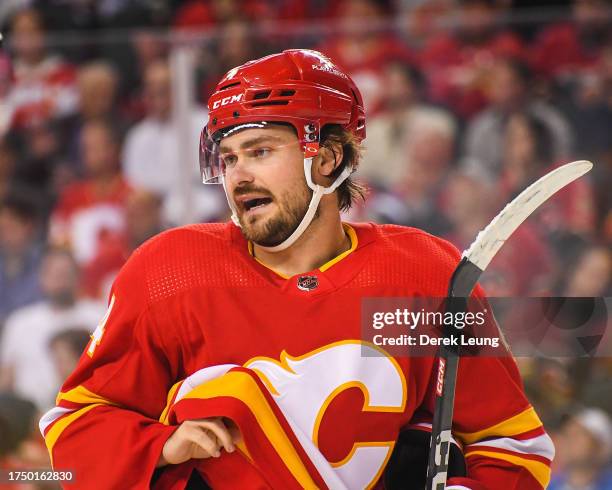 Rasmus Andersson of the Calgary Flames in action against the Winnipeg Jets during an NHL game at Scotiabank Saddledome on October11, 2023 in Calgary,...