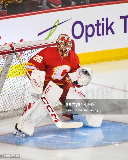 Jacob Markstrom of the Calgary Flames in action against the Winnipeg Jets during an NHL game at Scotiabank Saddledome on October11, 2023 in Calgary,...
