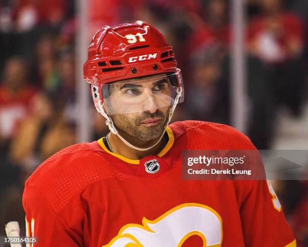 Nazem Kadri of the Calgary Flames in action against the Winnipeg Jets during an NHL game at Scotiabank Saddledome on October11, 2023 in Calgary,...