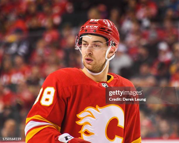 Andrew Mangiapane of the Calgary Flames in action against the Winnipeg Jets during an NHL game at Scotiabank Saddledome on October11, 2023 in...