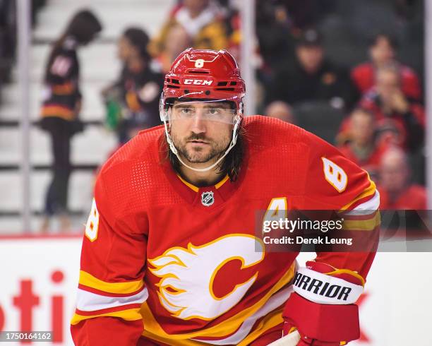 Christopher Tanev of the Calgary Flames in action against the Winnipeg Jets during an NHL game at Scotiabank Saddledome on October11, 2023 in...