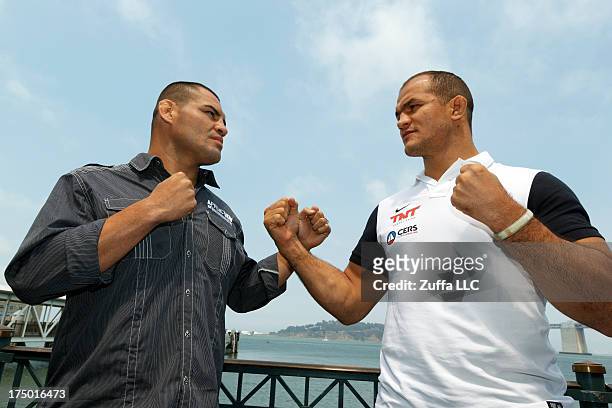 Cain Velasquez and Junior dos Santos square off during a UFC press tour event on July 29, 2013 in San Francisco, California.
