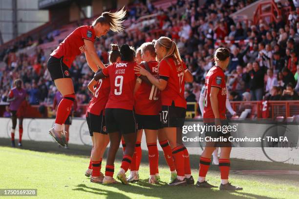 Kayleigh Green of Charlton Athletic celebrates with teammates after scoring the team's second goal during the Barclays Women's Championship match...