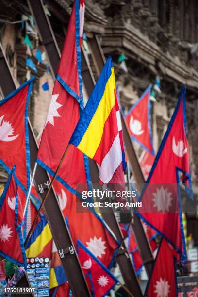 nepal flags and buddhist flags - nepal flag stock pictures, royalty-free photos & images
