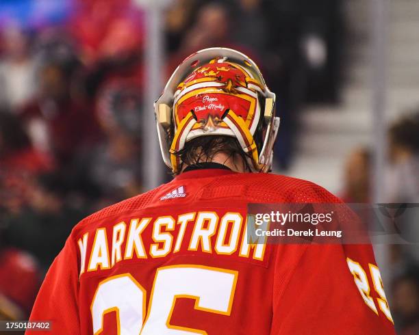 Jacob Markstrom of the Calgary Flames in action against the Winnipeg Jets during an NHL game at Scotiabank Saddledome on October11, 2023 in Calgary,...