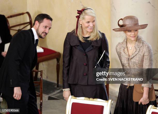 Godfather and Godmothers Crown Prince Haakon of Norway, his wife Crown Princess Mette-Marit and Swedish Crown Princess Victoria are seen during the...