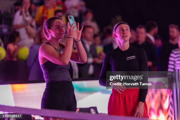 Jodie Burrage of Great Britain and Jil Teichmann of Switzerland celebrate after doubles the final against Leolia Jeanjean of France and Valeriya...