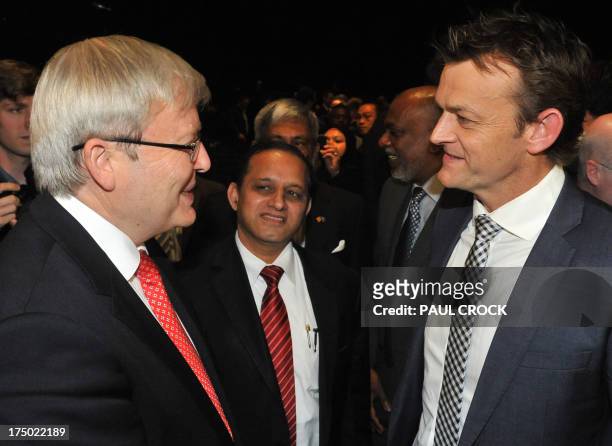 Australia's Prime Minister Kevin Rudd speaks to former Australian cricketer Adam Gilchrist at the official launch of the 2015 Cricket World Cup in...