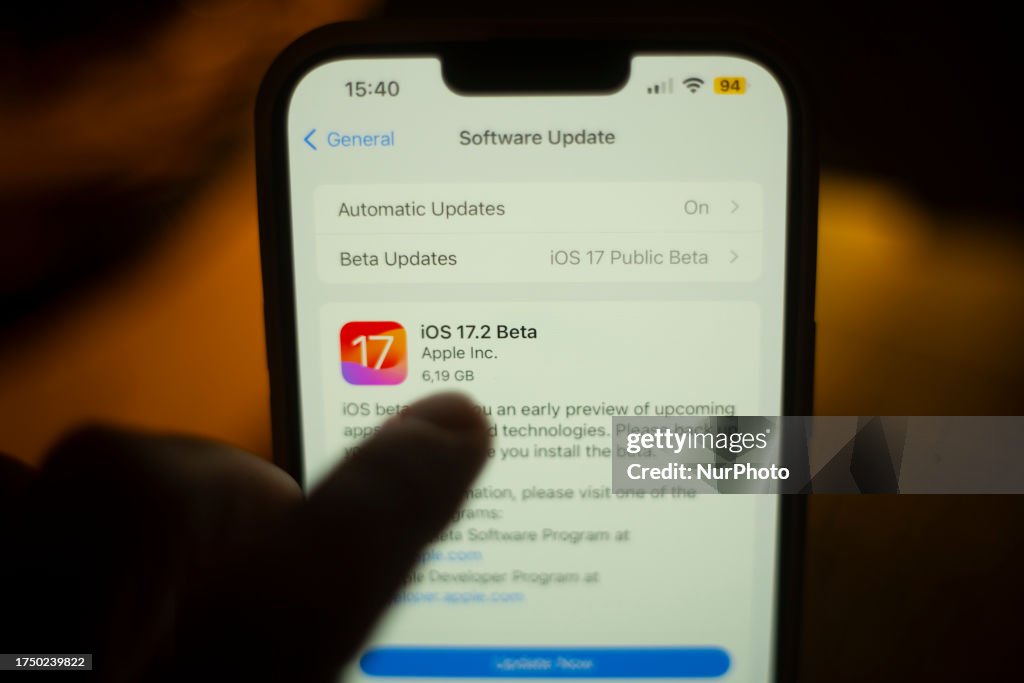An iPhone with iOS17 software update is seen in this illustration ...