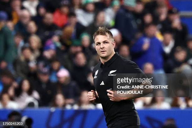New Zealand's openside flanker and captain Sam Cane leaves the field after receiving a yellow card during the France 2023 Rugby World Cup Final match...