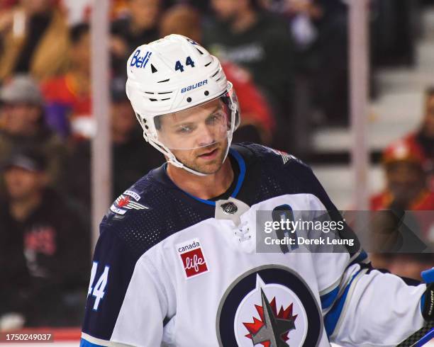 Josh Morrissey of the Winnipeg Jets in action against the Calgary Flames during an NHL game at Scotiabank Saddledome on October 11, 2023 in Calgary,...