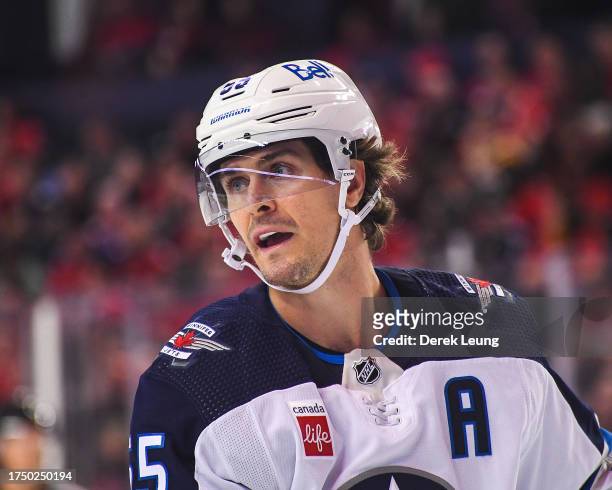 Mark Scheifele of the Winnipeg Jets in action against the Calgary Flames during an NHL game at Scotiabank Saddledome on October 11, 2023 in Calgary,...