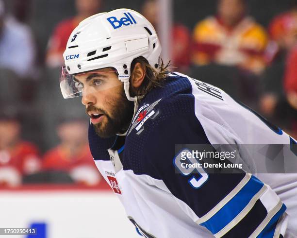 Alex Lafallo of the Winnipeg Jets in action against the Calgary Flames during an NHL game at Scotiabank Saddledome on October 11, 2023 in Calgary,...
