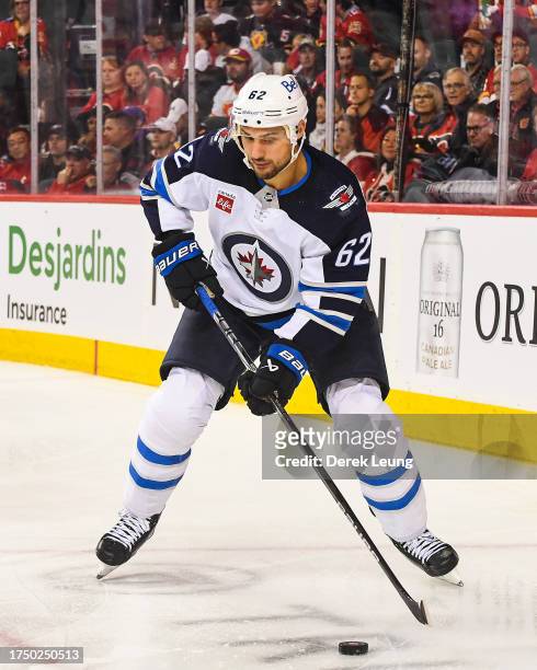Nino Niederreiter of the Winnipeg Jets in action against the Calgary Flames during an NHL game at Scotiabank Saddledome on October 11, 2023 in...