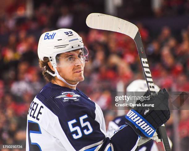 Mark Scheifele of the Winnipeg Jets in action against the Calgary Flames during an NHL game at Scotiabank Saddledome on October 11, 2023 in Calgary,...