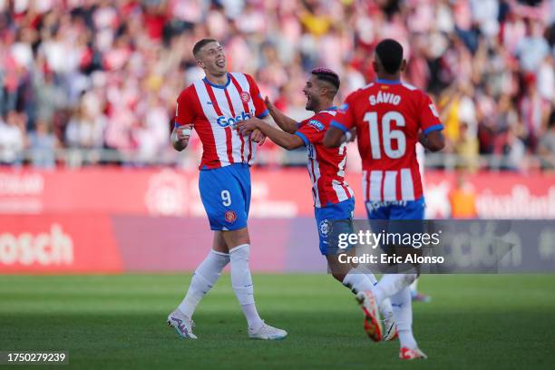 Artem Dovbyk of Girona FC celebrates after scoring the team's third goal during the LaLiga EA Sports match between Girona FC and UD Almeria at...