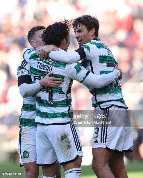 Tomoki Iwata of Celtic celebrates with team mates after scoring his team's fourth goal during the Cinch Scottish Premiership match between Heart of...