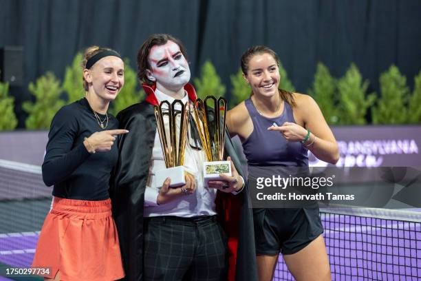 Champions Jodie Burrage of Great Britain and Jil Teichmann of Switzerland with the tournament mascot after doubles final during the Transylvania Open...