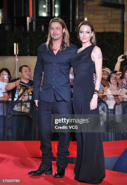 Actress Angelina Jolie and actor Brad Pitt attend the 'World War Z' Japan Premiere at Roppongi Hills on July 29, 2013 in Tokyo, Japan.