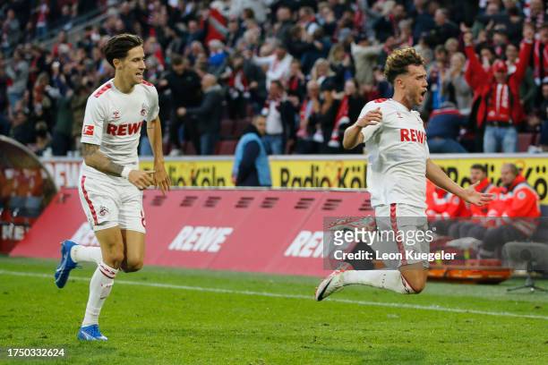 Luca Waldschmidt of 1.FC Köln celebrates with Denis Huseinbasic of 1.FC Köln after scoring the team's third goal during the Bundesliga match between...