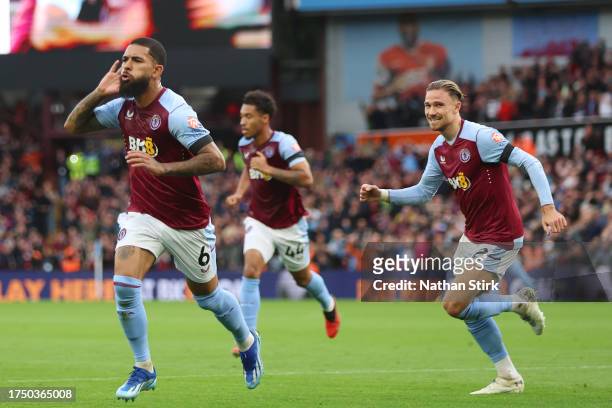 Douglas Luiz of Aston Villa celebrates after scoring the team's first goal during the Premier League match between Aston Villa and West Ham United at...